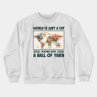 Funny crochet saying |  World is just a cat playing with a ball of yarn Crewneck Sweatshirt